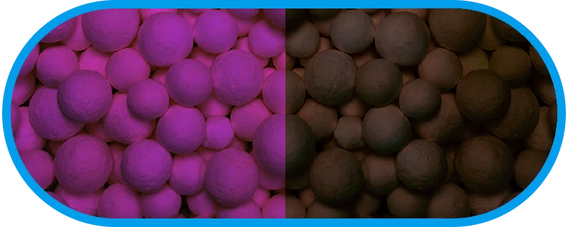 Poresphere Aktiv-AL K8 fresh purple and exhausted brown granules side by side in oval form
